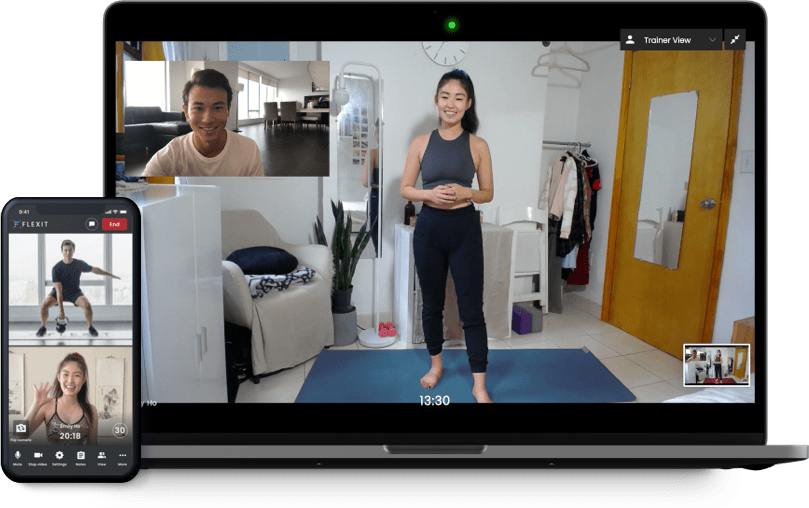 Personal trainer guiding a workout out with a user on a laptop